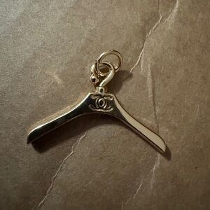 CHANEL Rare Iconic gold tone Hanger Charm